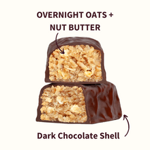 OVERNIGHT OATS + NUT BUTTER: two cross-sectioned bars coated in Dark Chocolate Shell showing oat and nut filling