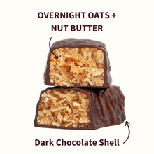 Stacked chocolate bars cut open showing oat-nut filling — OVERNIGHT OATS + NUT BUTTER; Dark Chocolate Shell