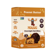 Three-quarter view of Mooski Peanut Butter Overnight Oat Bites box showcasing dark chocolate-dipped oat bites, 80 calories and 3g sugar badges on white background