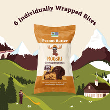 Front view of Mooski Peanut Butter Overnight Oat Bites package showing "6 Individually Wrapped Bites" headline and 80 calories label on illustrated mountain background